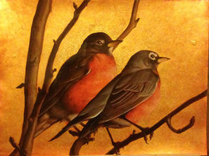 Two Robins on branches.