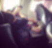 Flexible woman sleeping on flight