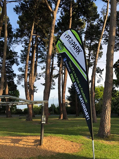 PT in the Park flag in front of the Monkey Bars at Carlton Corner of Hagley Park