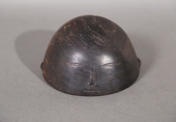 A subtly - carved shaped face