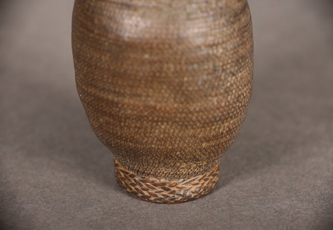 A closer look at the basket’s base. Plaiting was the technique used to construct the base
