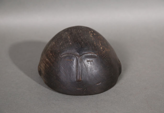 A wooden hat with excellent patina