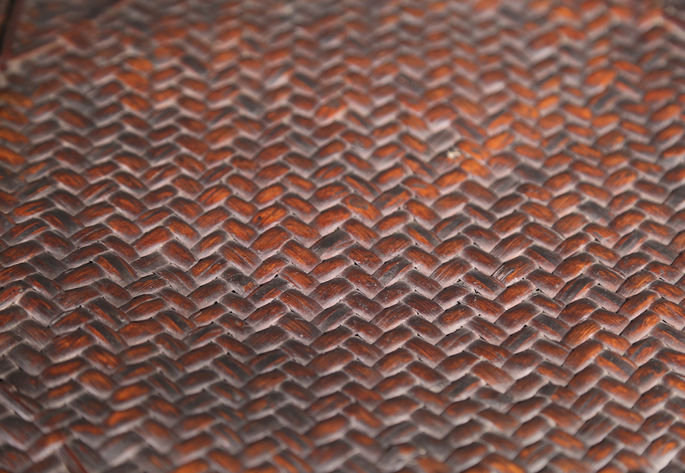 A detailed photo that shows the basket’s plaited construction