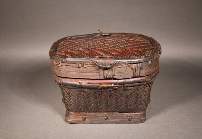 This small basket is called kupit or kopit, it has a detachable lid that covers its compartment