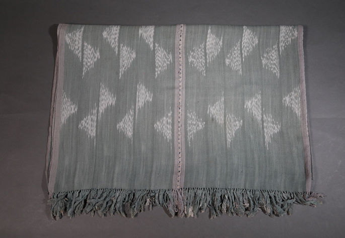 White hipbag motifs are repeated horizontally which are divided by a stripes design