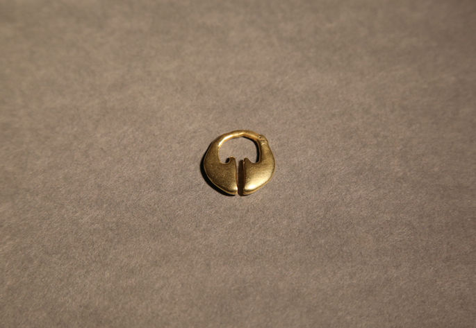 Lingling-o (2)
A pendant made of gold plating depicting a uterus and the hollow inside, signifying the phallus, is worn by both male and female in the Cordillera Region and is believed to bring good fortune and fertility