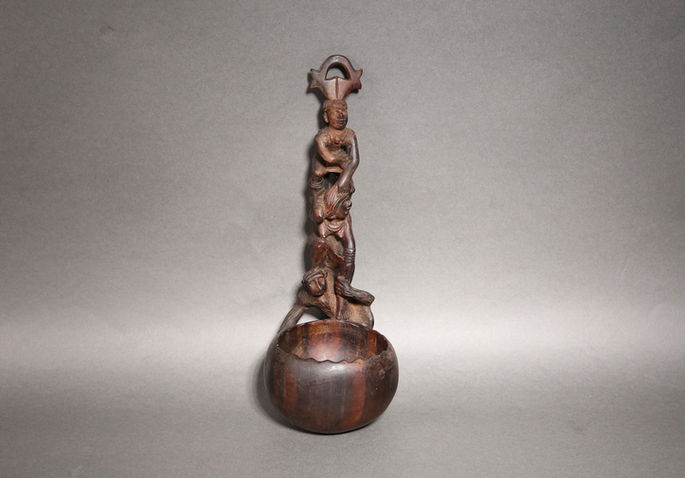 An example of a Cordilleran wine dipper with an intricate carving
