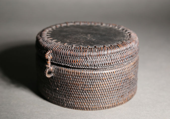 A dark brown akopan basket