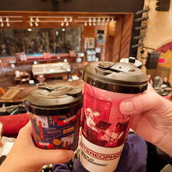 Drinks at the Theater: Inside Golden Theatre with cups that say Stereophonic on them and the set in the background