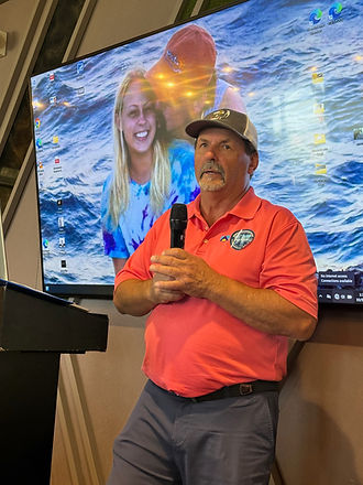 Bob Werner speaking about his late daughte Becky (also pictured).