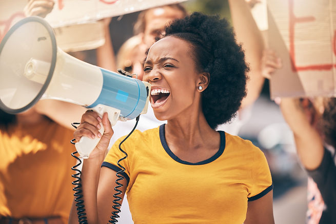 protest-megaphone-and-speech-of-angry-black-woman-2022-12-31-04-26-40-utc.jpg