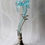 Thumbnail: Vintage blue glass lily vase with silver-plated base and spiral metal support