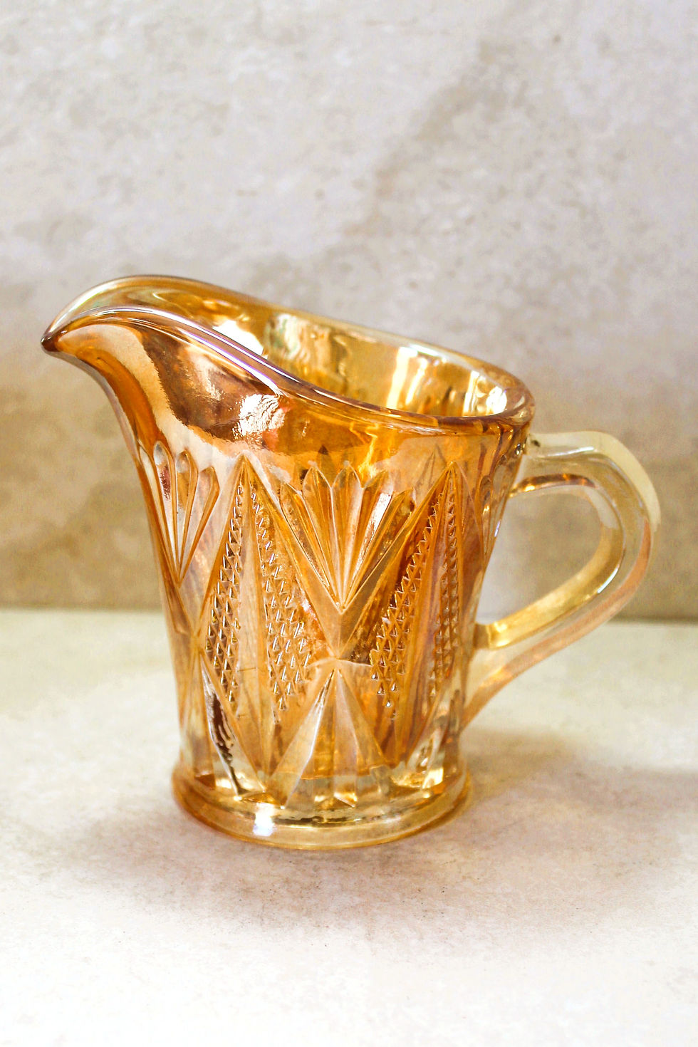 Thumbnail: Marigold carnival glass cream jug with iridescent orange-gold finish and classic vintage styling
