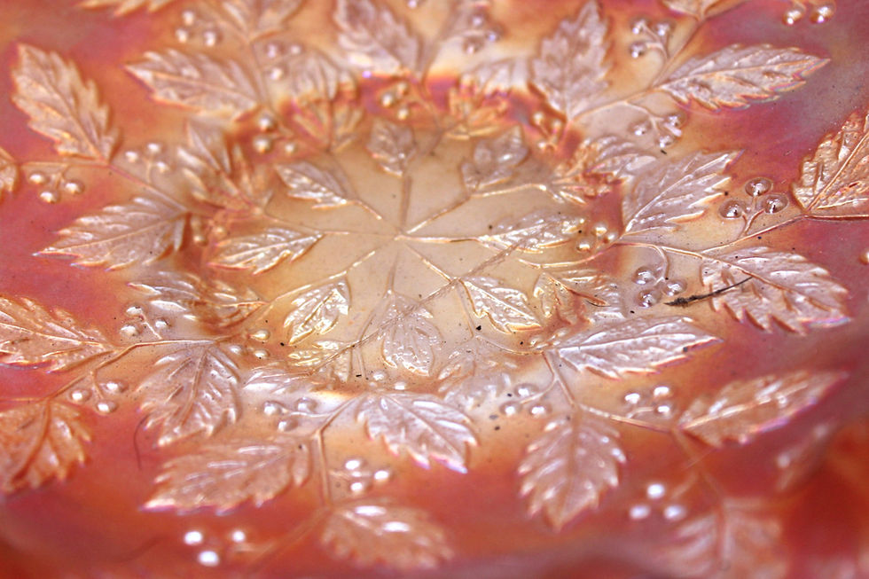 Thumbnail: Centre detail of Fenton “Holly & Berries” pattern with radiant orange-gold finish.