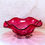 Thumbnail: Vintage cranberry glass bowl with ruffled rim and clear shell footed base.