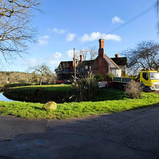 Ross Reclamation delivery truck at Lower Brockhampton Manor during restoration work