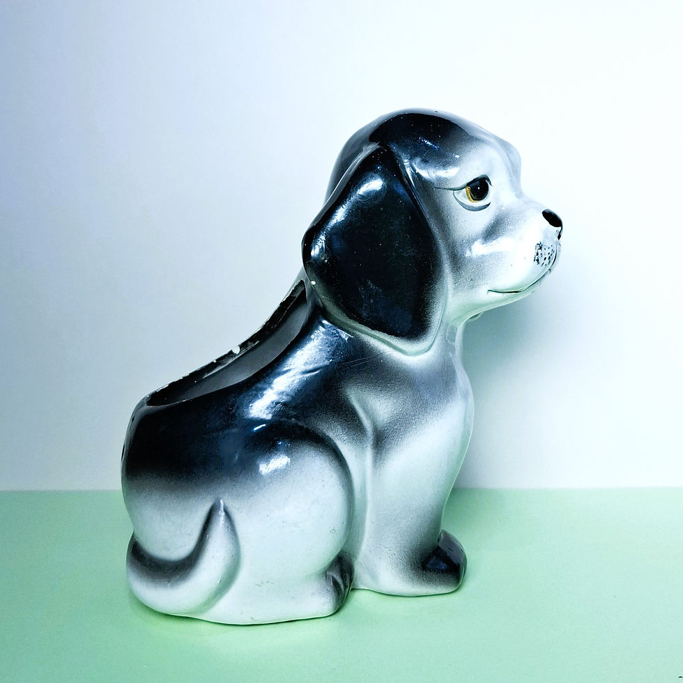 Thumbnail: Angled view of vintage Relpo ceramic dog planter with glossy finish.