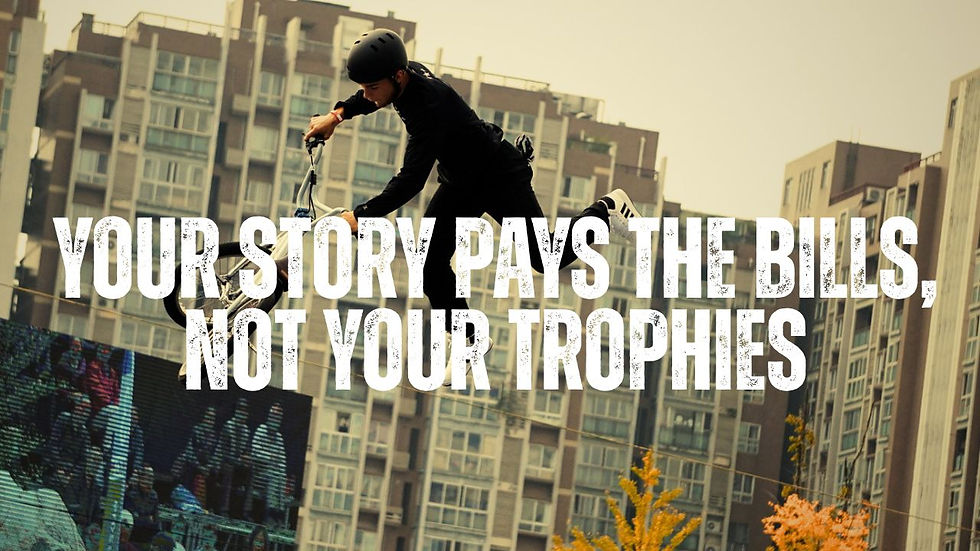 A photo of a BMX Freestyle Athlete with text that says your story pays the bills not your trophies