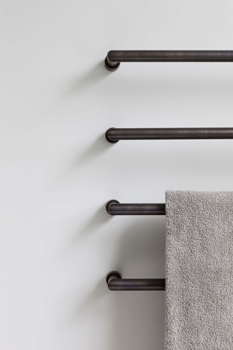 Dark bronze towel rain in ensuite - St John's Wood interior design by Catherine Wilman