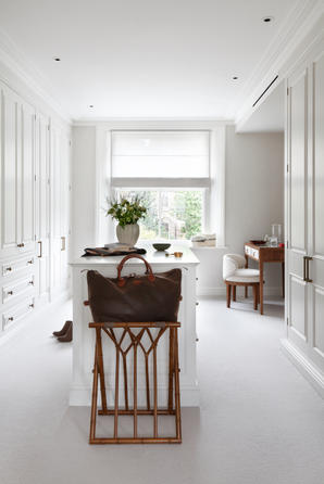 Bespoke joinery dressing room designed by Catherine Wilman for a project in St John's Wood, London.