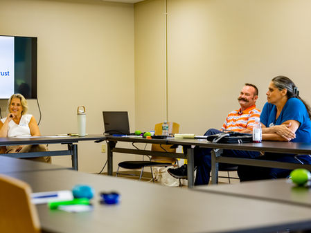 Attendees at NH Children's Trust's provider listening session listening attentively as a colleague shares a comment.