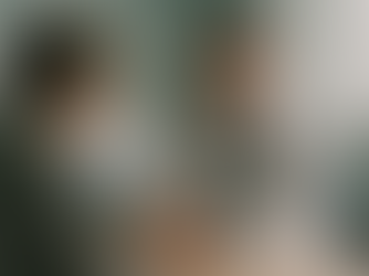 A doctor sitting across from a distressed relative in a softly lit hospital room, gently holding their hand with a compassionate expression. The setting includes a hospital bed and medical equipment in the background, subtly highlighting empathy and emotional support.