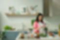 Woman preparing a nutrient-dense smoothie to support hormone balance and gut health