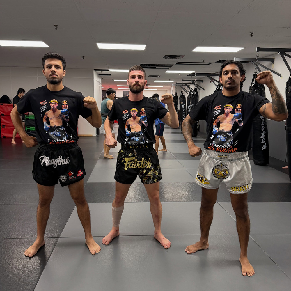 Elite Fight Club team standing together on the gym mats
