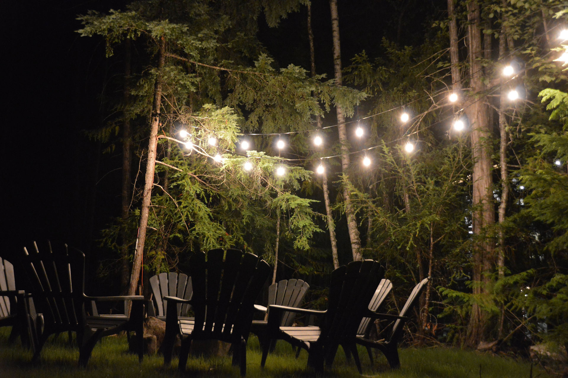 Chairs around Woodland Cabin's Campfire Pit