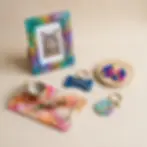 Packshot photography of artisanal resin crafts, featuring a marbling technique on a photo frame, tray, earrings, and pet-themed keychains.