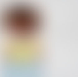 little girl reading yellow book