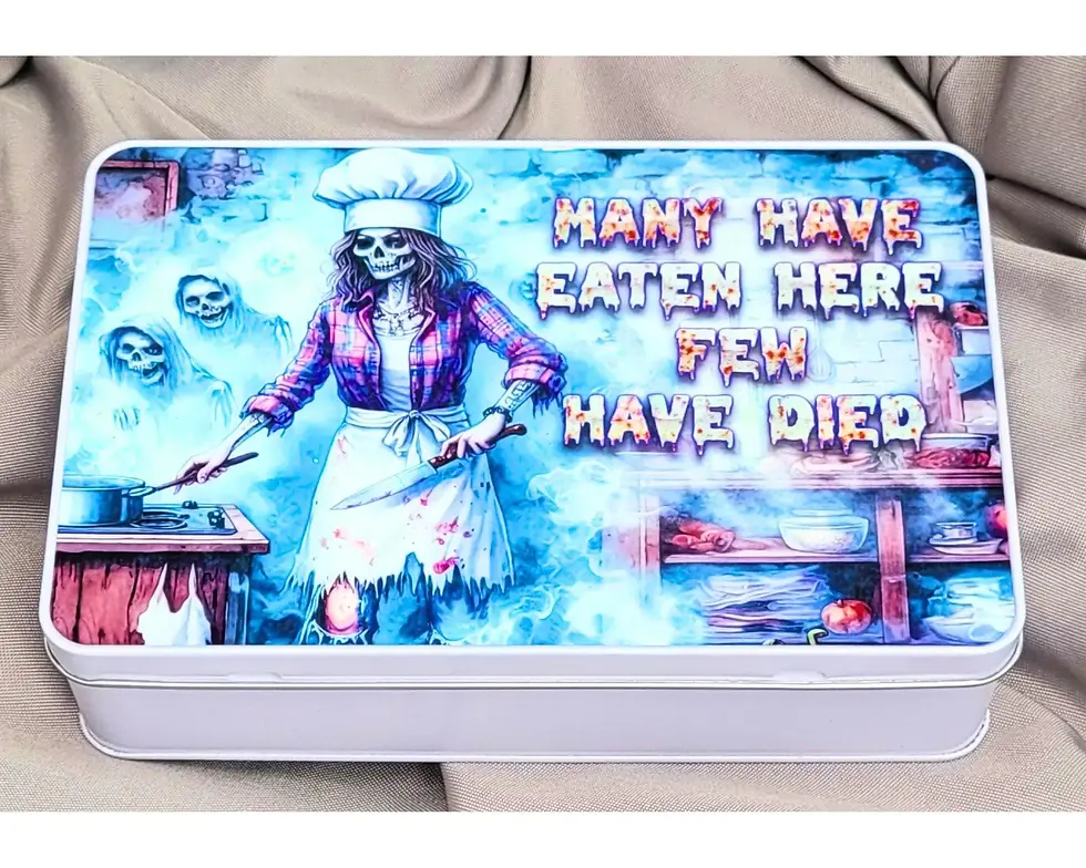 Funny gothic biscuit tin featuring skeleton chef with text “Many Have Eaten Here Few Have Died” – Mystical Witch Gifts