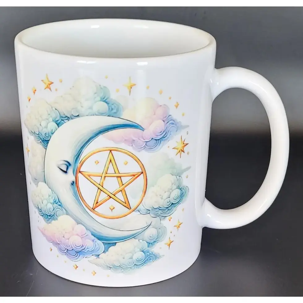 White ceramic mug with crescent moon and gold pentacle design — celestial witchy coffee cup with clouds and stars.