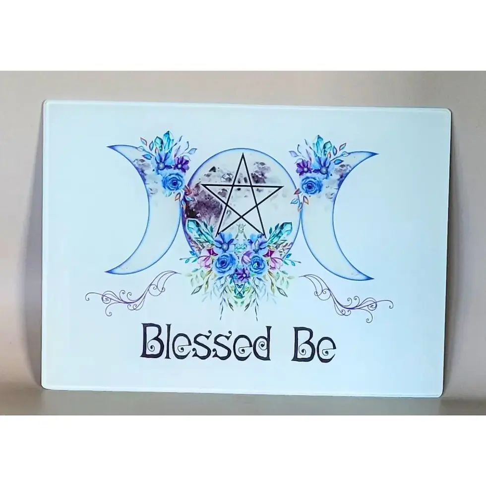 glass witchy chopping board with triple moon and blessed be design