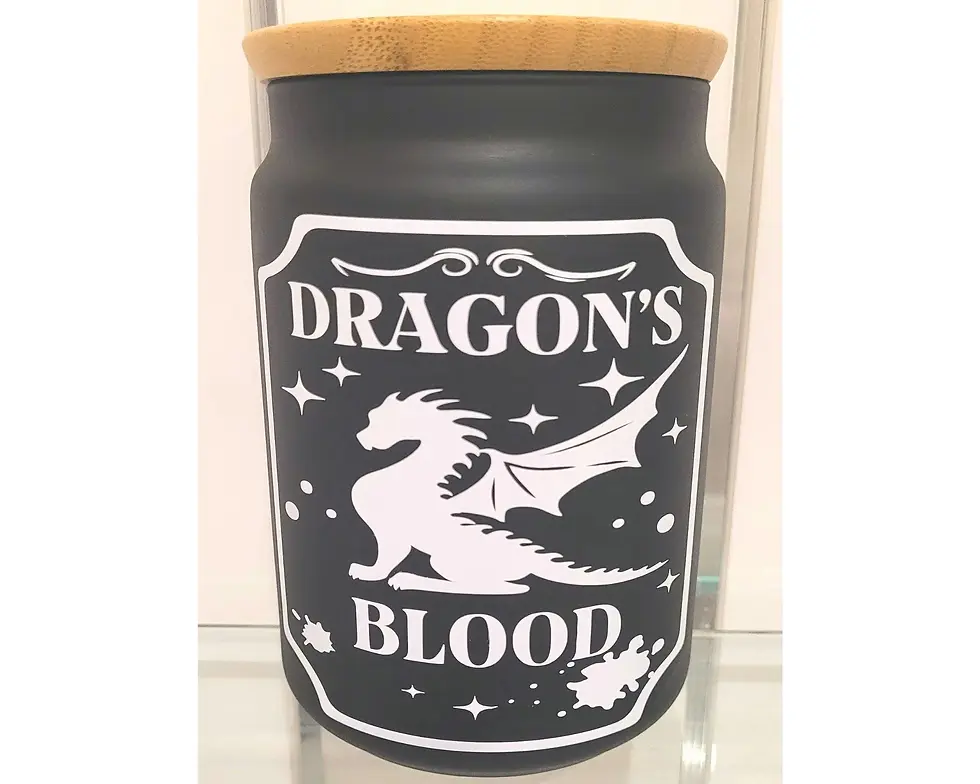 Black jar with dragon design and wooden lid — gothic storage canister and witchy kitchen decor