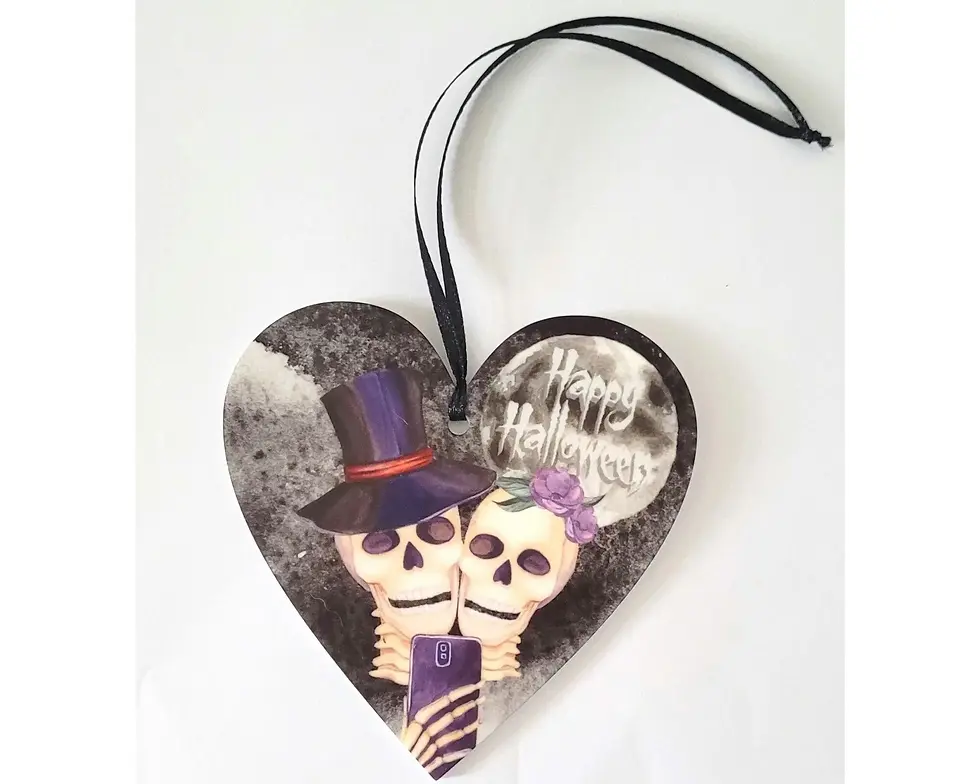 Heart-shaped acrylic ornament with skeleton couple — gothic home decor and witchy gift