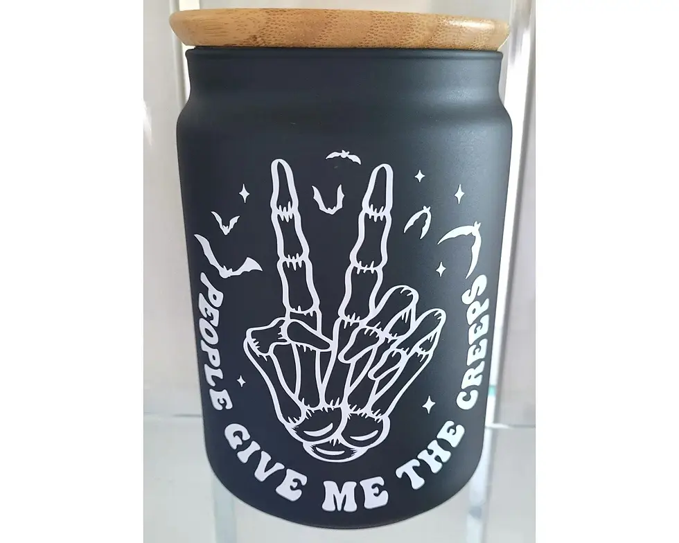 Thumbnail: Gothic black glass storage jar with bamboo lid and white skeleton hand design reading “People Give Me The Creeps.”
