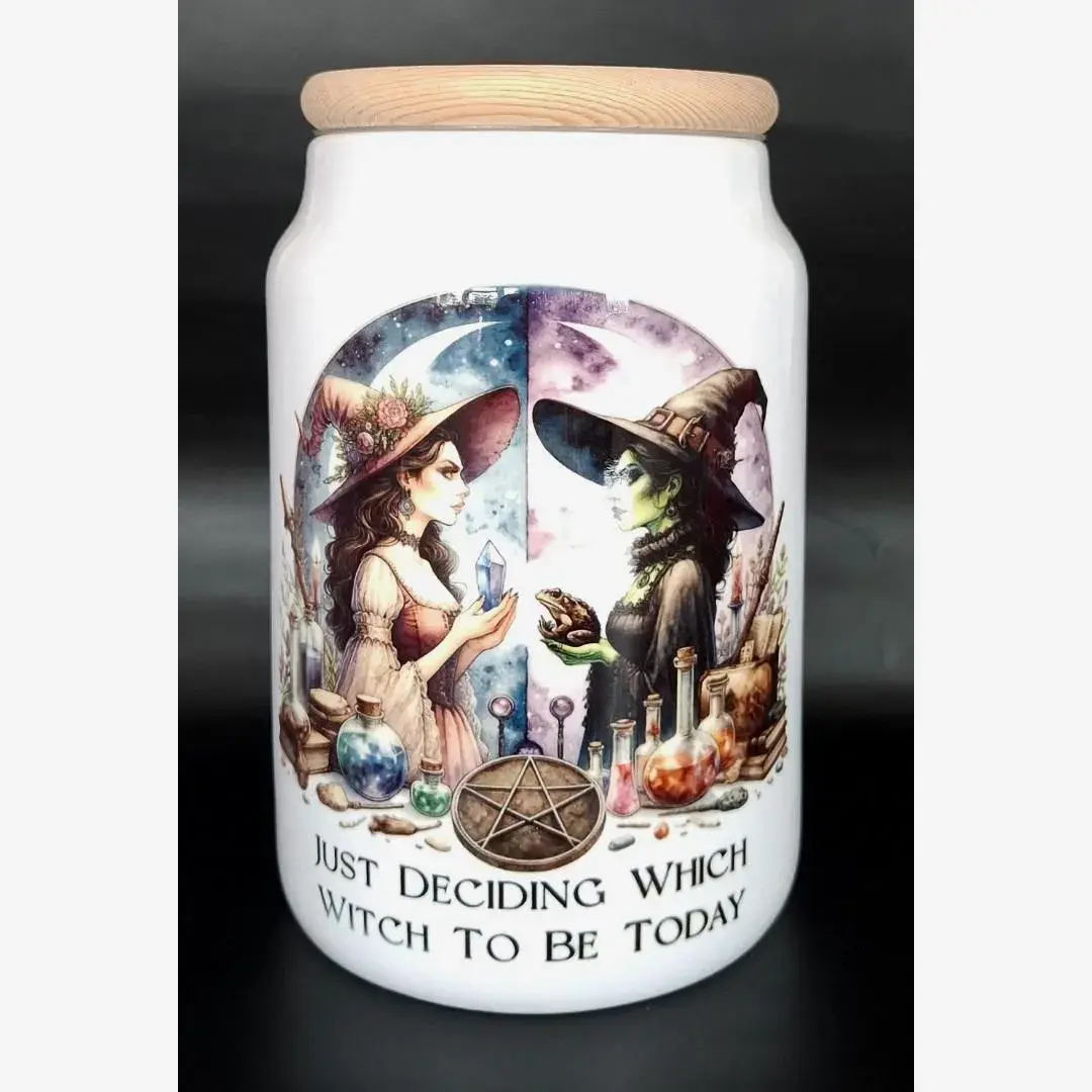 white ceramic witchy storage jar with two witches and text “Just Deciding Which Witch to Be Today"