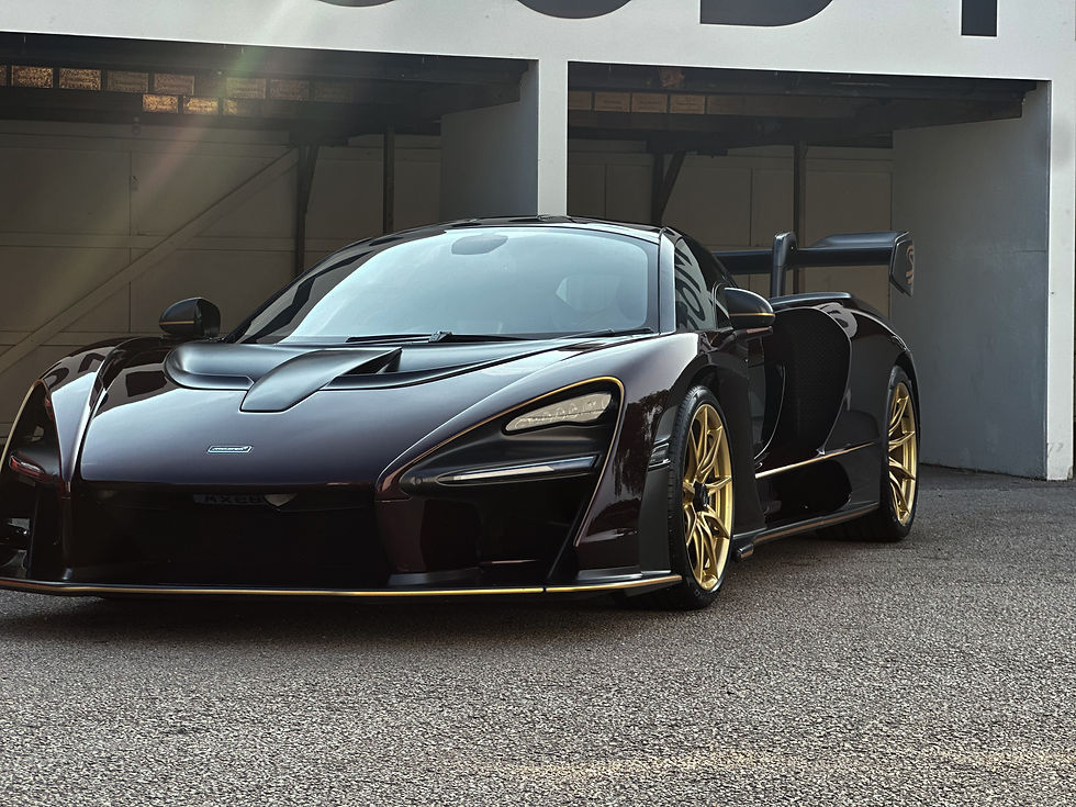 High angle view of a clean and shiny car parked in a shaded driveway