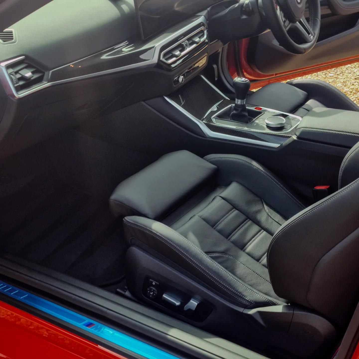 Clean BMW interior, black leather seats