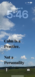 Coastal marsh wallpaper with blue sky and the quote “Calm Is a Practice, Not a Personality.”