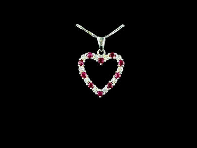 White gold diamond and ruby heart necklace