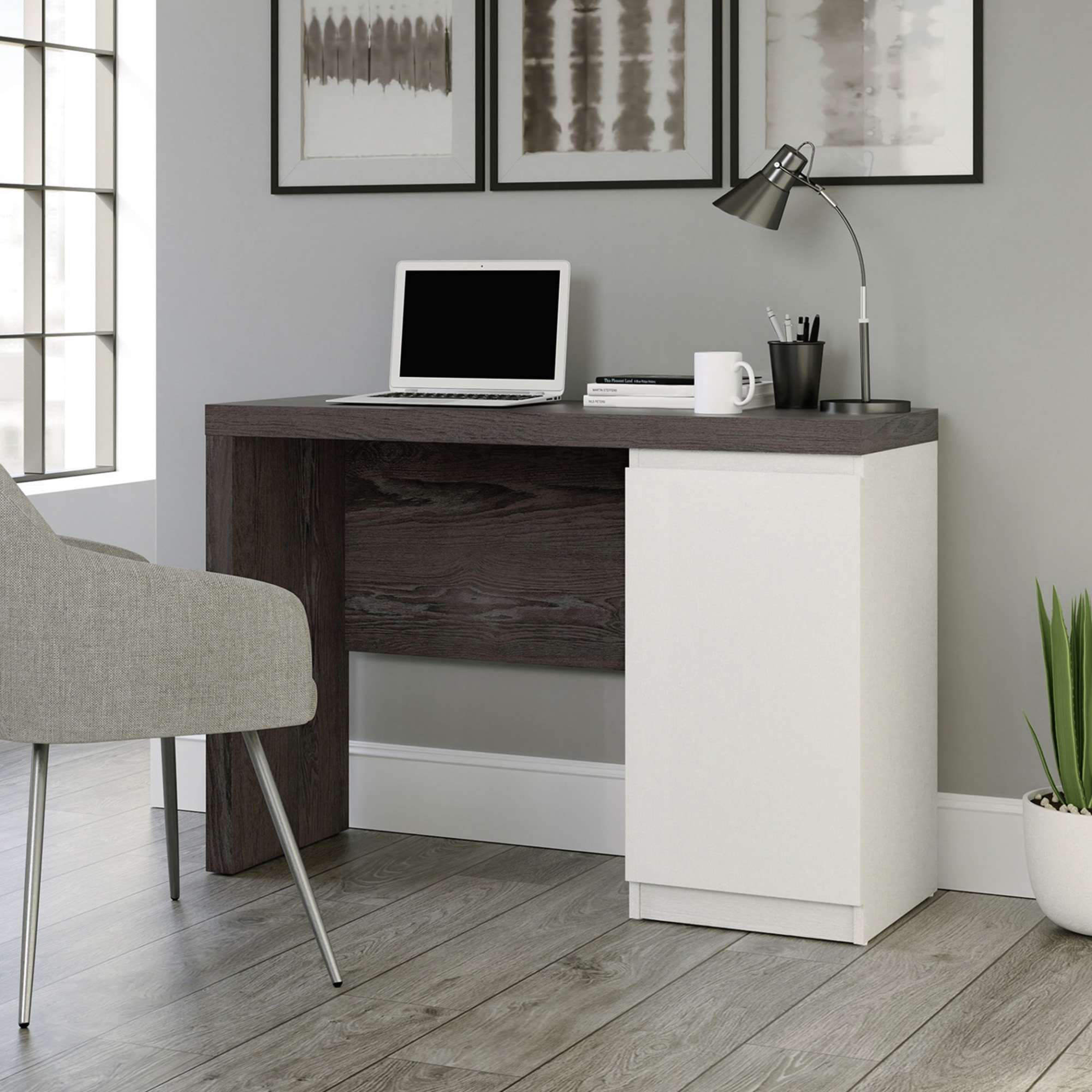Barletta home office desk in oak and white colour shown in working environment