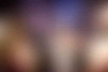 Bride smiling and dancing on the dance floor