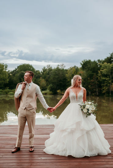 Bride and groom lakeside at Persimmons Creek Beaverdam Virginia Venue