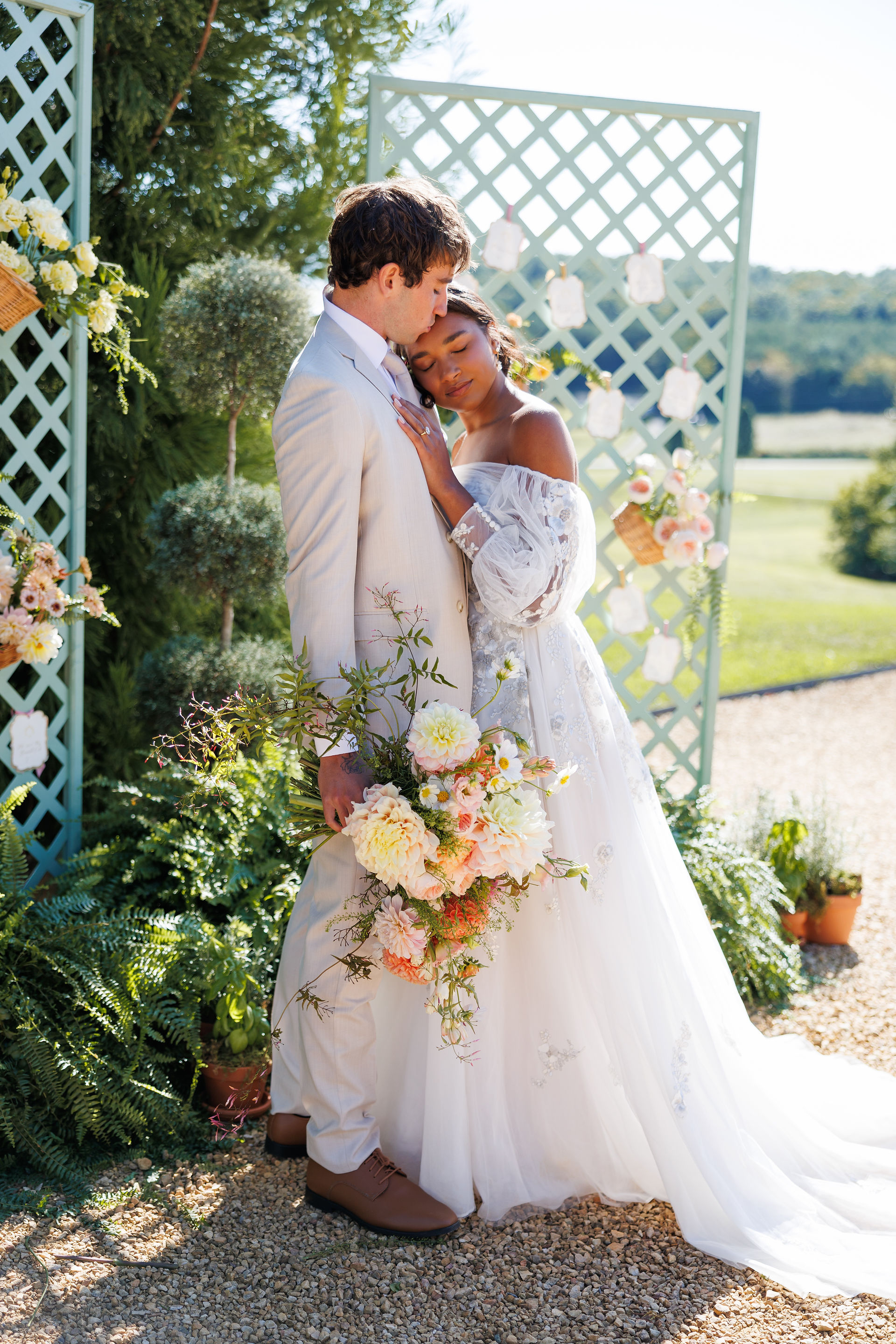 Bride Leaning Head on Grooms Shoulder 
