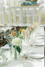 A long table of colorful flowers