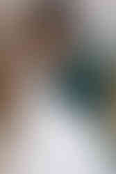 A bride and groom embracing in a hug