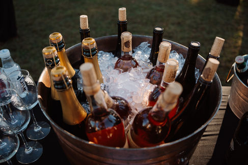Bottles of wine chilled in a bucket