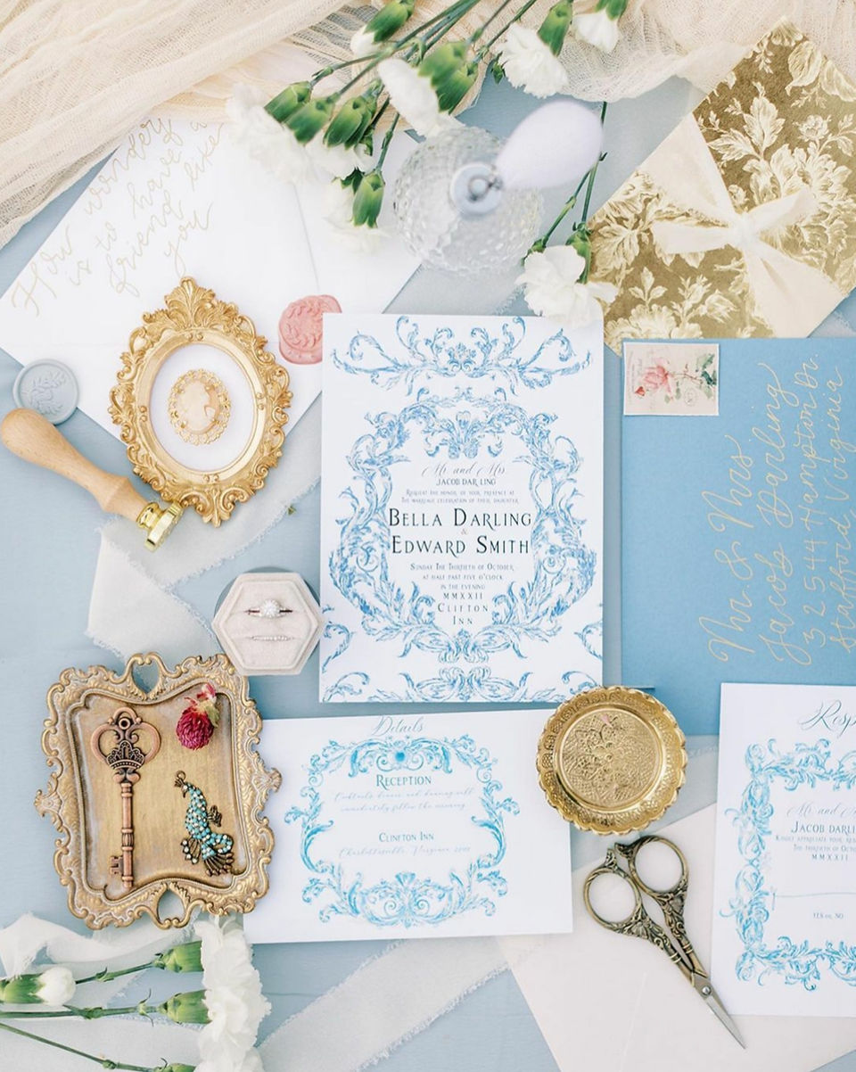 A blue and white wedding stationery suite